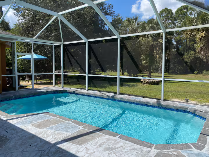 2 Acres 3BR/2BA Prime Location Salt Heated Pool